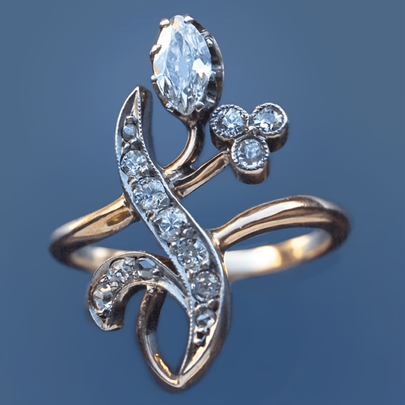 Elegant Artistic Coiled Snake Ring with Floral Motifs